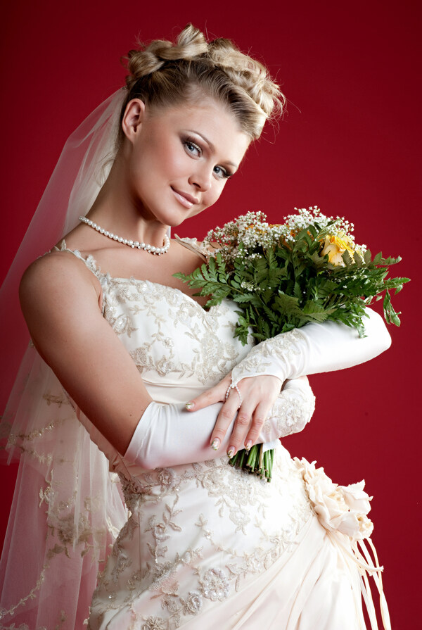 手捧鲜花的外国新娘摄影图片