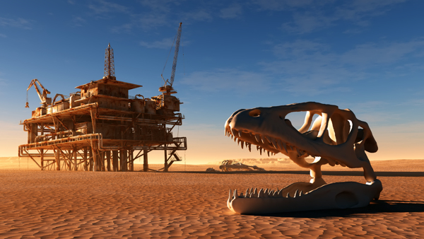 沙漠上的油井与恐龙骨骼图片