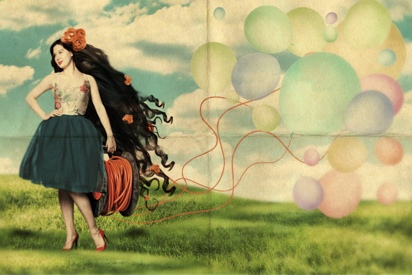 草地上的美女与气球图片