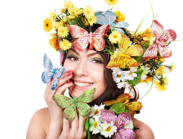 头戴花朵和蝴蝶的开心外国女人图片