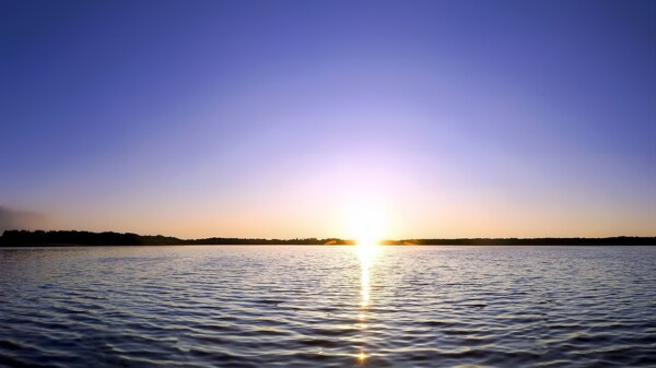 海边地平线朝阳背景图