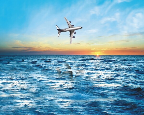 海上日出飞机图片